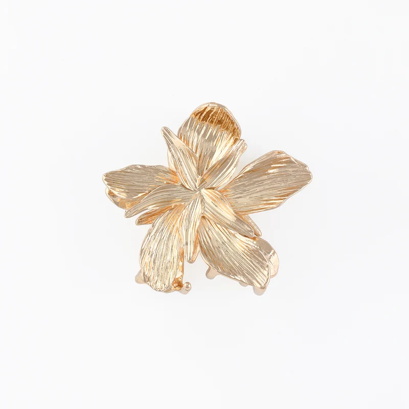 Pince à cheveux fleur dorée