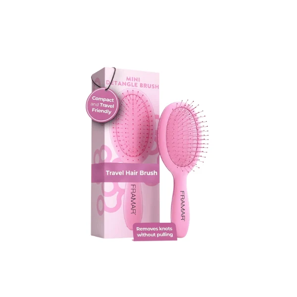 Mini brosse de voyage démêlante rose
